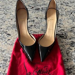 Black patent pumps which have been barely worn.